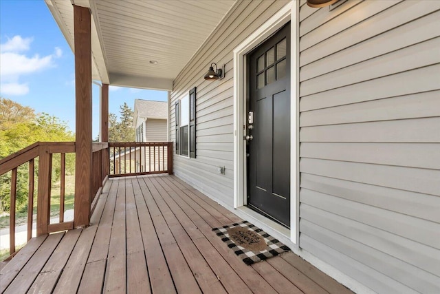 deck with covered porch