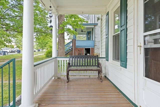 wooden terrace featuring a porch
