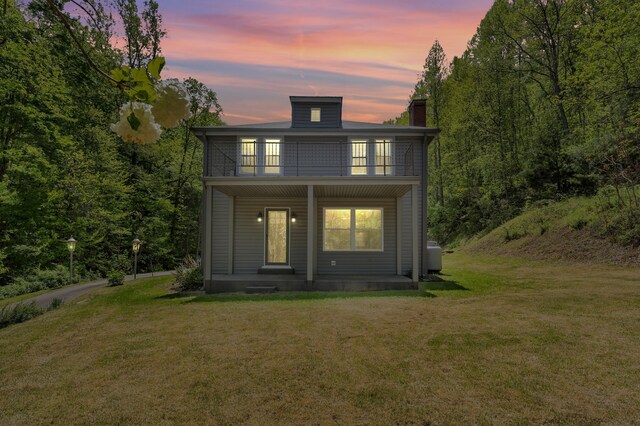 215 Heatherwood Dr, Boones Mill, VA 24065 - rear view of property featuring a yard, a porch, and a balcony