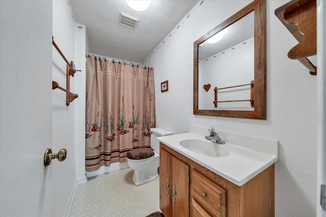 full bath featuring vanity, visible vents, toilet, a shower with shower curtain, and tile patterned floors