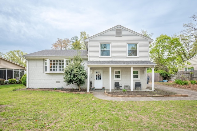 split level home with brick siding and a shingled roof