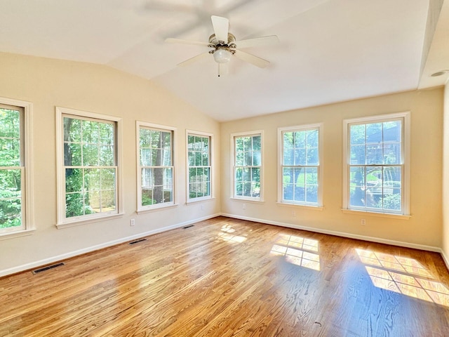 unfurnished sunroom featuring visible vents