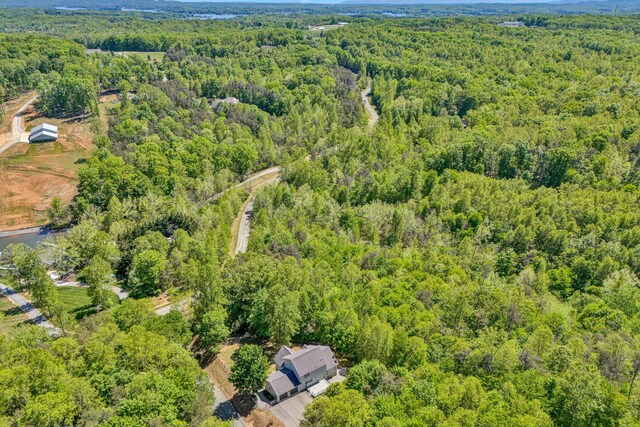 aerial view featuring a view of trees