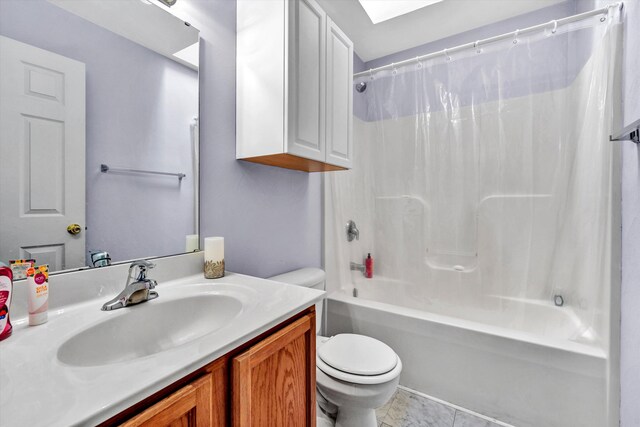 full bath featuring vanity, toilet, and shower / tub combo