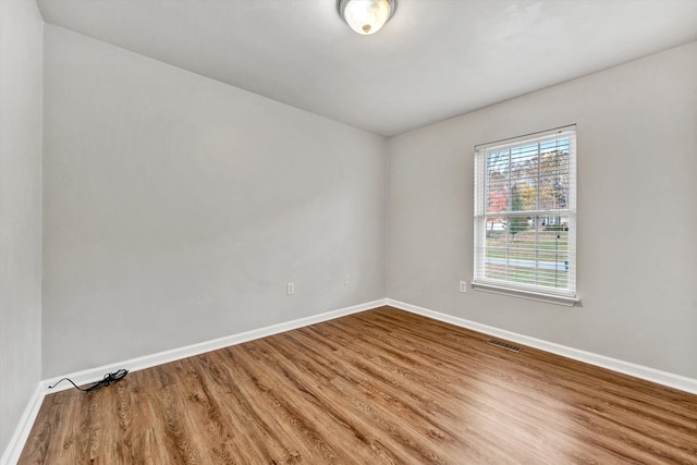 260 Harbor Landing Dr, Moneta, VA 24121 - spare room with baseboards and wood finished floors