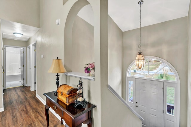 260 Harbor Landing Dr, Moneta, VA 24121 - entryway featuring high vaulted ceiling, wood finished floors, a chandelier, and baseboards