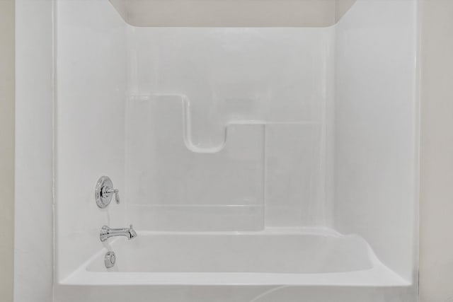 full bath featuring shower / bathtub combination