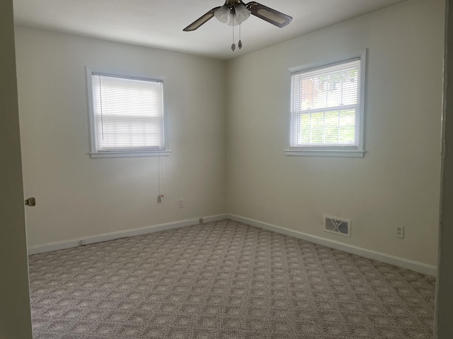 1508 Jefferson Ave, Clifton Forge, VA 24422 - spare room featuring carpet flooring, a ceiling fan, and baseboards