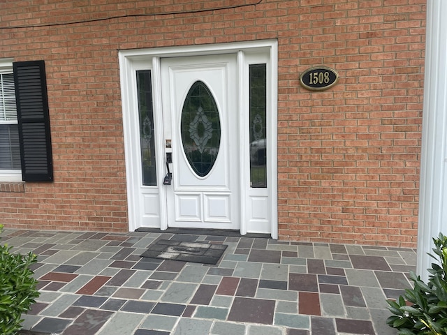 1508 Jefferson Ave, Clifton Forge, VA 24422 - doorway to property featuring brick siding