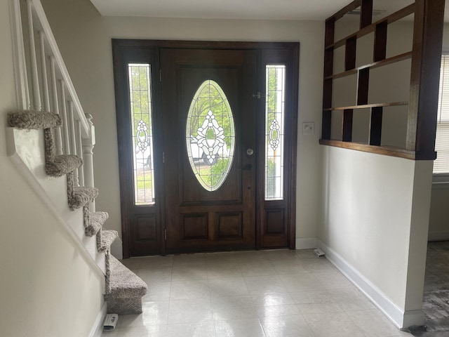 1508 Jefferson Ave, Clifton Forge, VA 24422 - foyer featuring stairs, baseboards, and light tile patterned floors