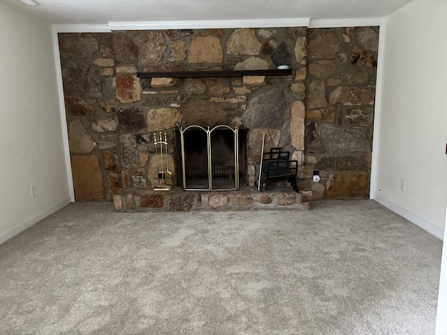 1508 Jefferson Ave, Clifton Forge, VA 24422 - detailed view of carpet flooring, a wood stove, and baseboards