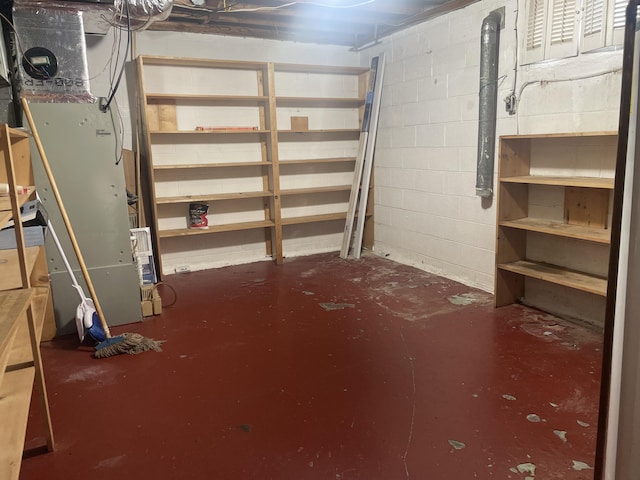 1508 Jefferson Ave, Clifton Forge, VA 24422 - unfinished below grade area featuring concrete block wall and heating unit