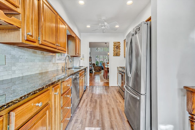 117 Windward Dr SW, Roanoke, VA 24018 - living area featuring decorative columns, a towering ceiling, a tiled fireplace, baseboards, and an inviting chandelier