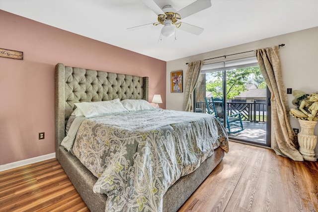 bedroom featuring access to outside, baseboards, ceiling fan, and wood finished floors