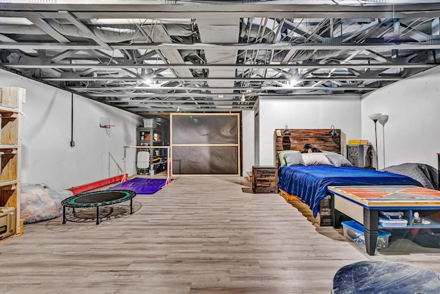 bedroom featuring wood finished floors