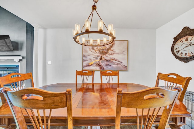 dining space with a chandelier