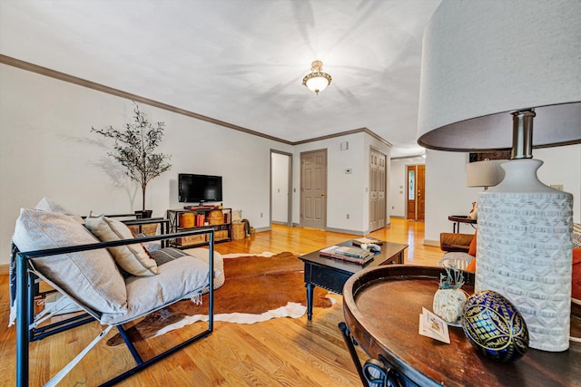 5531 Bethlehem Rd, Boones Mill, VA 24065 - living area featuring wood finished floors, baseboards, and ornamental molding