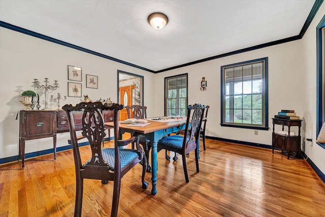 5531 Bethlehem Rd, Boones Mill, VA 24065 - dining area featuring ornamental molding, light wood-type flooring, and baseboards