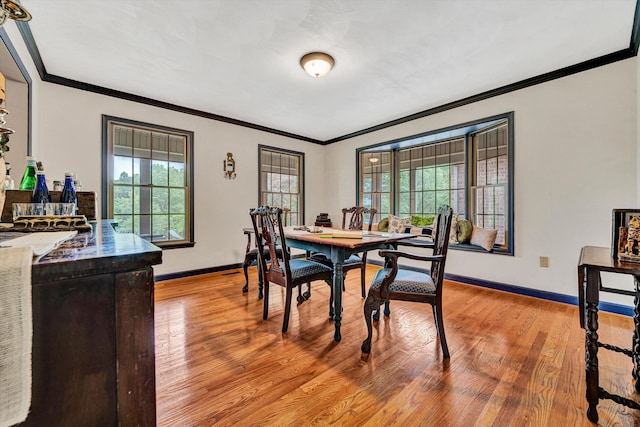 5531 Bethlehem Rd, Boones Mill, VA 24065 - dining room with crown molding, baseboards, and light wood finished floors
