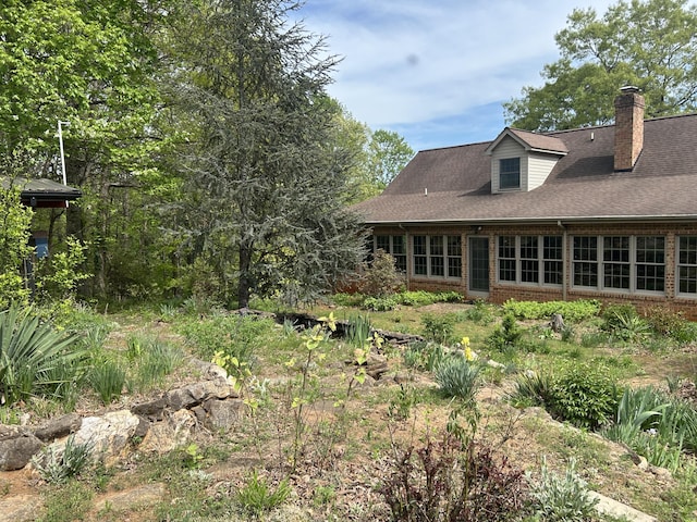 5531 Bethlehem Rd, Boones Mill, VA 24065 - rear view of property with brick siding, a chimney, and roof with shingles