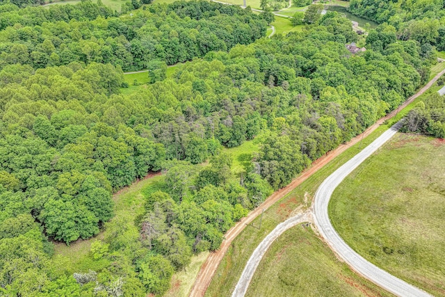5531 Bethlehem Rd, Boones Mill, VA 24065 - aerial view of property and surrounding area featuring a heavily wooded area