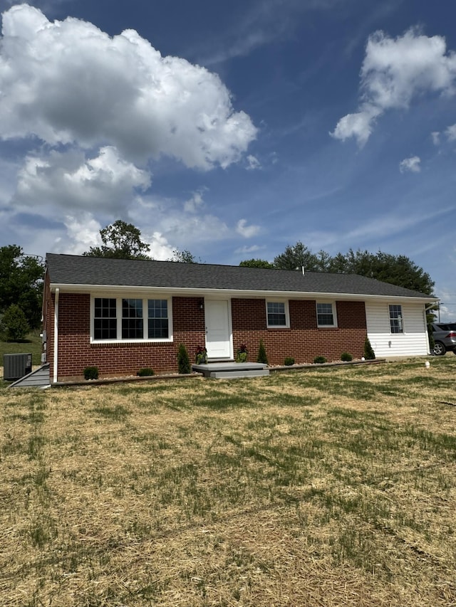 3779 Old Franklin Tpke, Glade Hill, VA 24092 - ranch-style home featuring brick siding, a front lawn, and central air condition unit