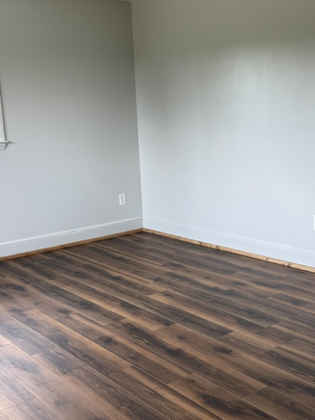 3779 Old Franklin Tpke, Glade Hill, VA 24092 - empty room featuring baseboards and dark wood-style floors