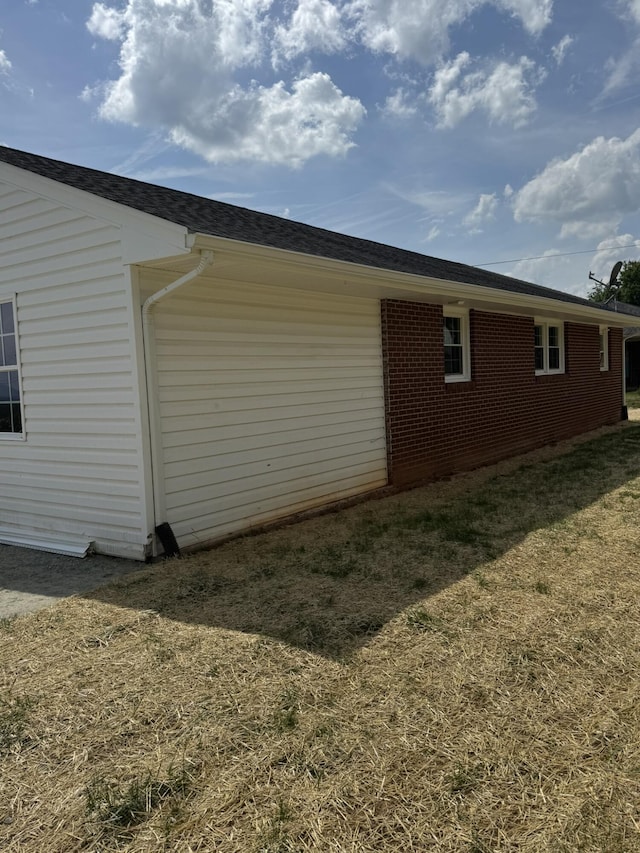 3779 Old Franklin Tpke, Glade Hill, VA 24092 - view of property exterior featuring a lawn, brick siding, and a shingled roof