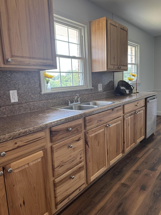 3779 Old Franklin Tpke, Glade Hill, VA 24092 - kitchen featuring dark countertops, a sink, dishwasher, decorative backsplash, and dark wood-type flooring