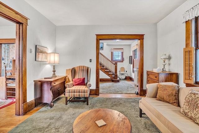 2226 Wycliffe Ave SW, Roanoke, VA 24014 - living room featuring wood finished floors, baseboards, and stairway