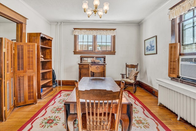 2226 Wycliffe Ave SW, Roanoke, VA 24014 - sitting room with a chandelier, radiator heating unit, hardwood / wood-style flooring, ornamental molding, and baseboards