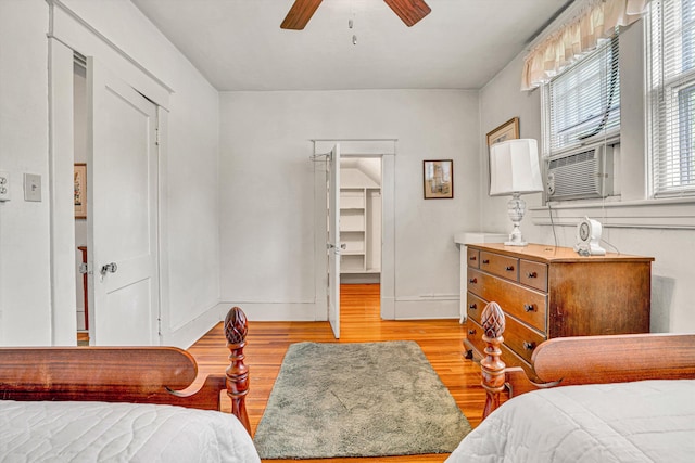 2226 Wycliffe Ave SW, Roanoke, VA 24014 - bedroom featuring light wood-type flooring, baseboards, cooling unit, and ceiling fan