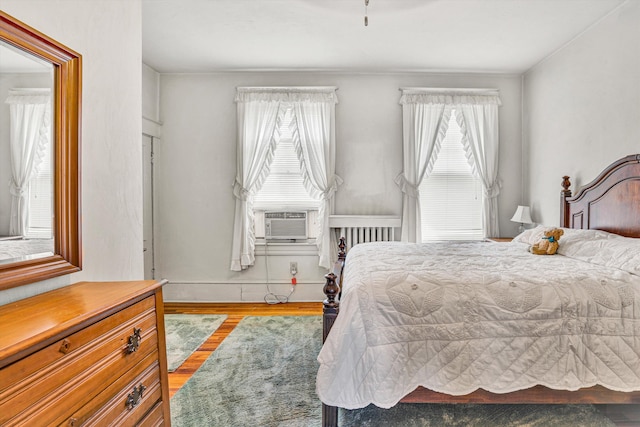 2226 Wycliffe Ave SW, Roanoke, VA 24014 - bedroom with cooling unit and wood finished floors