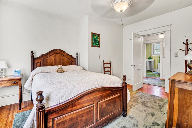 2226 Wycliffe Ave SW, Roanoke, VA 24014 - bedroom with radiator heating unit, wood finished floors, attic access, and ceiling fan