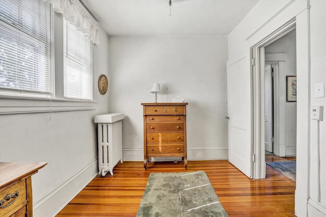 2226 Wycliffe Ave SW, Roanoke, VA 24014 - sitting room featuring radiator, wood finished floors, and baseboards