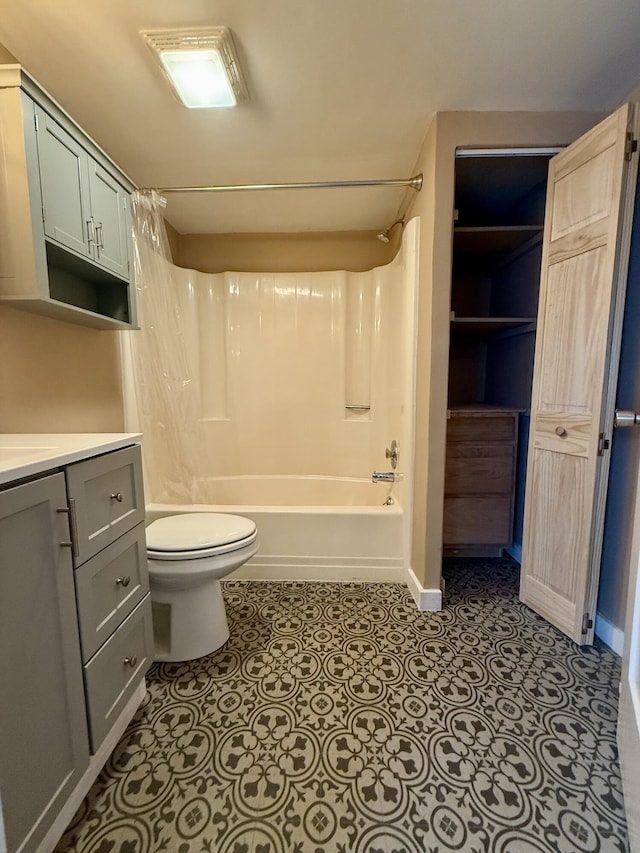 1518 Tazewell Ave SE, Roanoke, VA 24013 - full bathroom featuring washtub / shower combination, toilet, vanity, tile patterned flooring, and baseboards