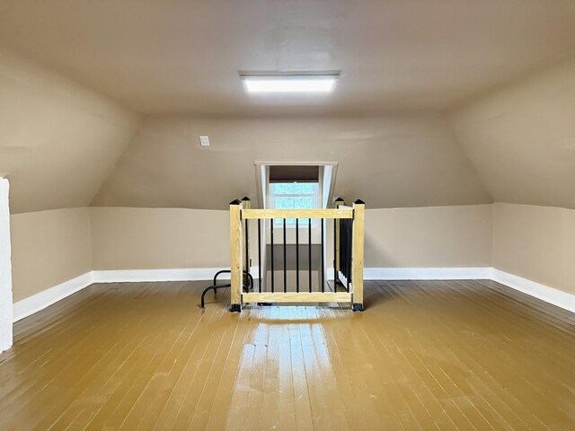 1518 Tazewell Ave SE, Roanoke, VA 24013 - bonus room with baseboards, lofted ceiling, and wood-type flooring