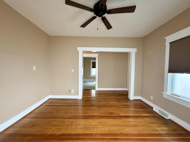 1518 Tazewell Ave SE, Roanoke, VA 24013 - empty room featuring a ceiling fan, baseboards, and wood finished floors