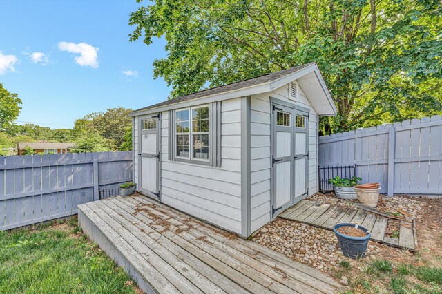 view of shed featuring a fenced backyard