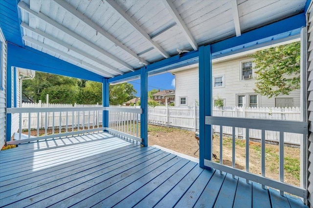 wooden terrace featuring a fenced backyard