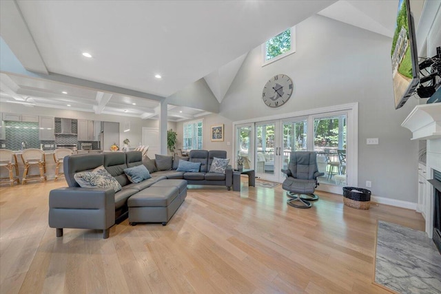 400 Heather Ln, Huddleston, VA 24104 - living area with a fireplace with flush hearth, light wood-style floors, healthy amount of natural light, recessed lighting, and beam ceiling