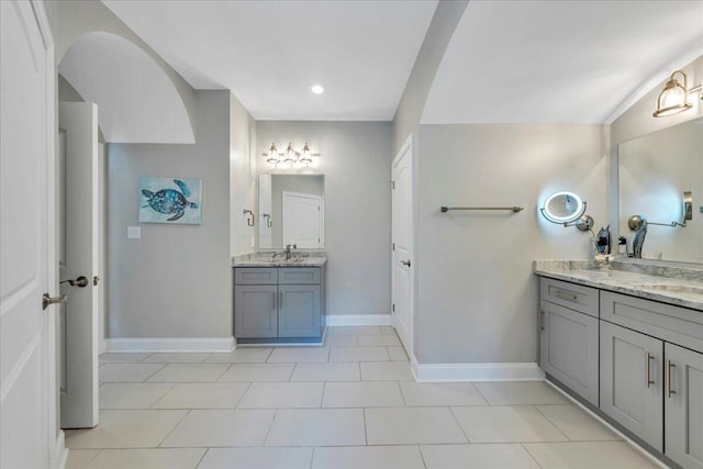 400 Heather Ln, Huddleston, VA 24104 - full bathroom with baseboards, two vanities, tile patterned flooring, and recessed lighting