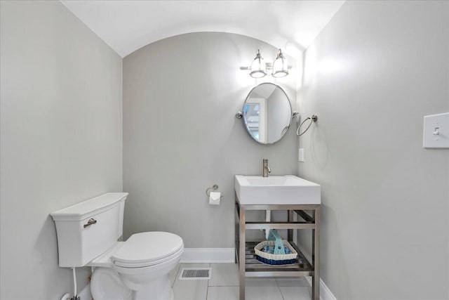400 Heather Ln, Huddleston, VA 24104 - half bath featuring tile patterned flooring, baseboards, toilet, and a sink