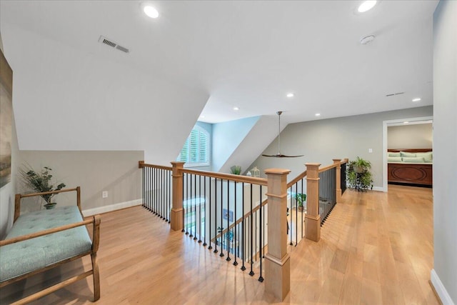 400 Heather Ln, Huddleston, VA 24104 - hall with light wood-type flooring, an upstairs landing, baseboards, and recessed lighting