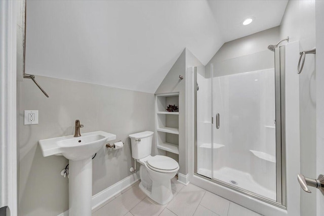 400 Heather Ln, Huddleston, VA 24104 - bathroom featuring lofted ceiling, a shower stall, toilet, baseboards, and a sink