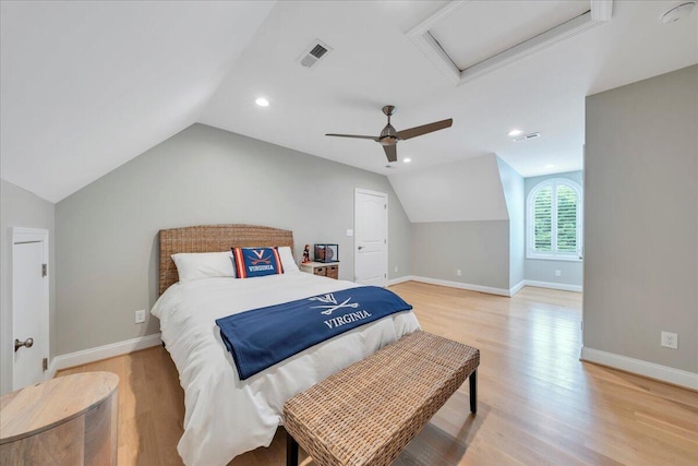 400 Heather Ln, Huddleston, VA 24104 - bedroom featuring attic access, vaulted ceiling, light wood-style flooring, ceiling fan, and baseboards