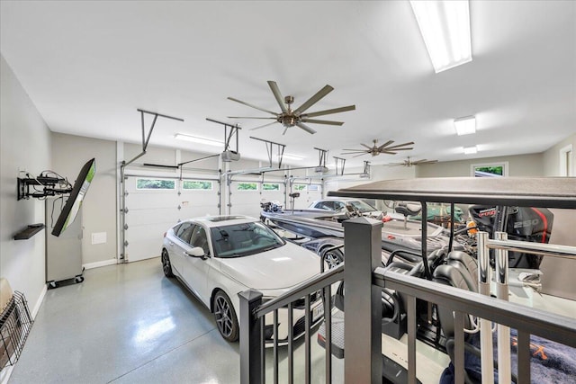 400 Heather Ln, Huddleston, VA 24104 - garage featuring baseboards and a garage door opener