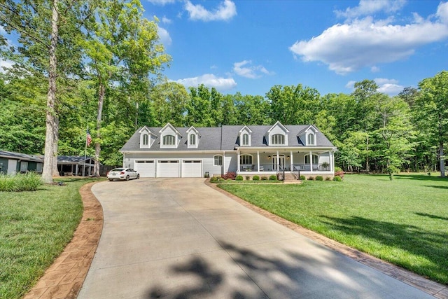 400 Heather Ln, Huddleston, VA 24104 - cape cod-style house with a porch, an attached garage, a front lawn, concrete driveway, and view of scattered trees