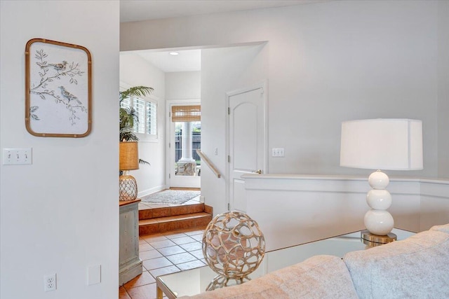 tiled bedroom with baseboards