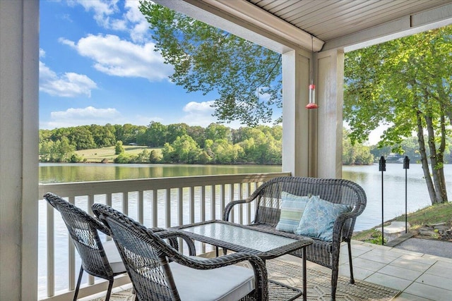 balcony featuring a water view